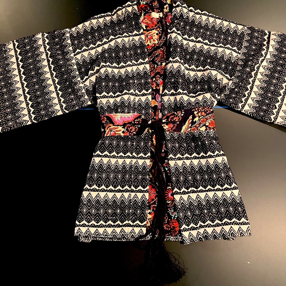 Guadalupe reversible bohemian jacket with tie belt.